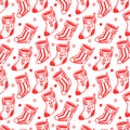 Christmas pattern with red winter socks for gifts on white background.